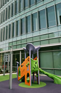 The kid-friendly health care facility, which includes general pediatrics, includes an outdoor play structure.